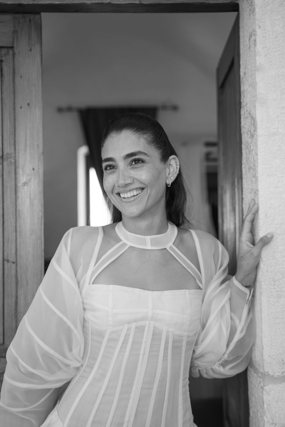 Masseria San Paolo Grande Wedding: Yasemin & Omer's Ostuni Celebration 20 Bride's portrait in natural light before the Masseria San Paolo Grande wedding