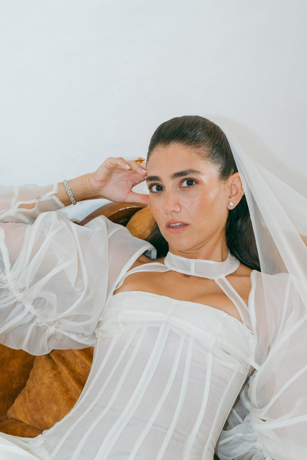 Masseria San Paolo Grande Wedding: Yasemin & Omer's Ostuni Celebration 21 Bride's reclining portrait before the Masseria San Paolo Grande wedding