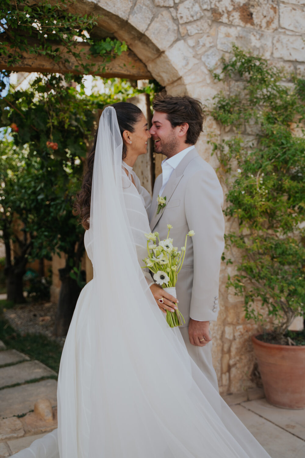 Masseria San Paolo Grande Wedding: Yasemin & Omer's Ostuni Celebration 42 Bride's ceremony-day portrait in the courtyard at Masseria San Paolo Grande