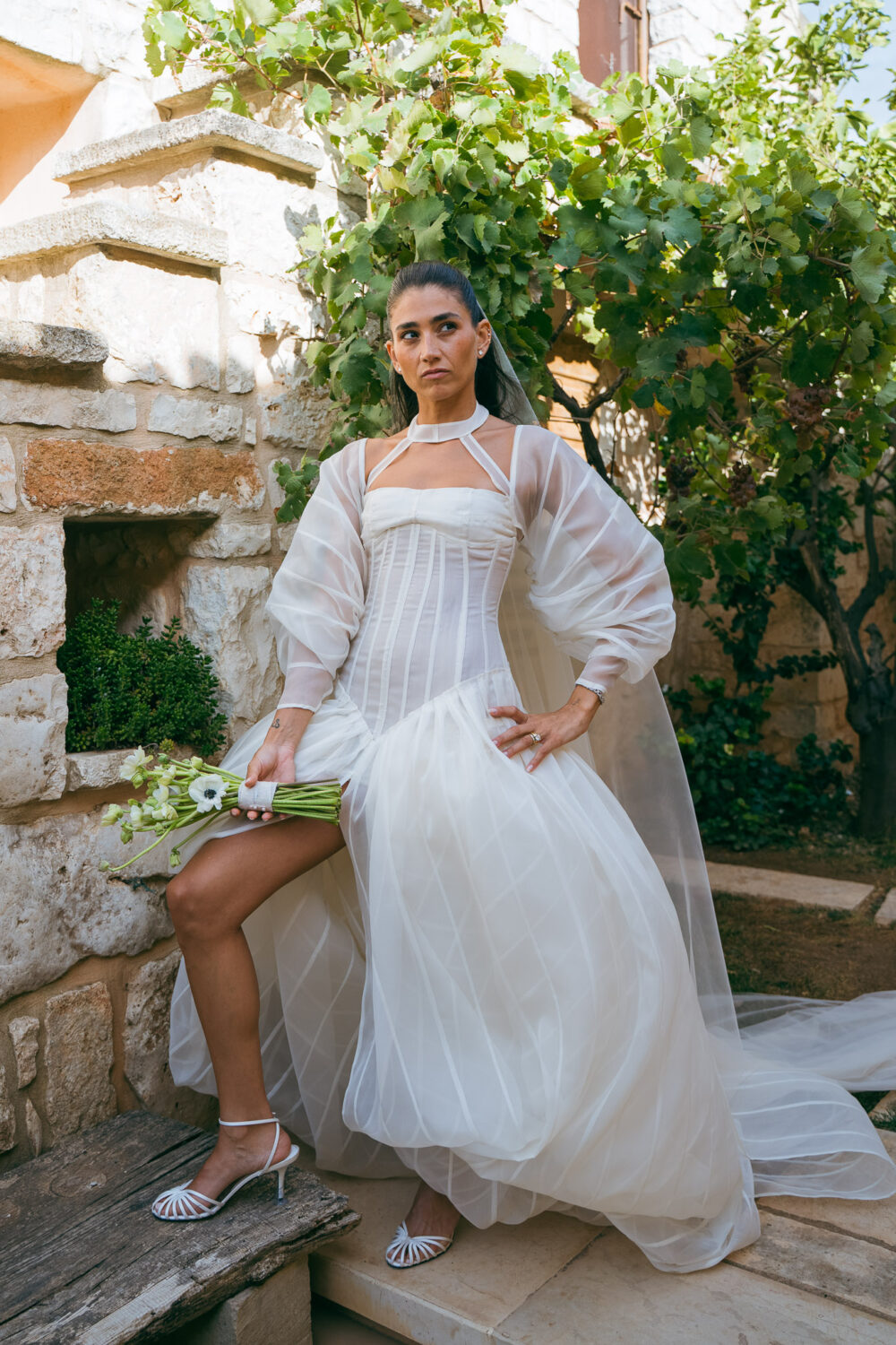 Masseria San Paolo Grande Wedding: Yasemin & Omer's Ostuni Celebration 5 Bride portrait among the estate's grapevines at Masseria San Paolo Grande