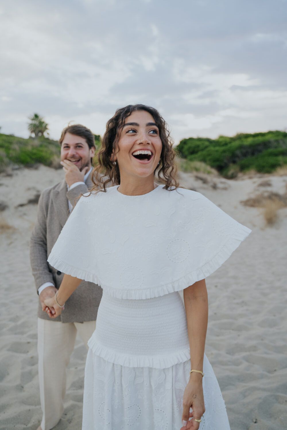 Masseria San Paolo Grande Wedding: Yasemin & Omer's Ostuni Celebration 33 Bride and groom candid moment at Ostuni a Mare