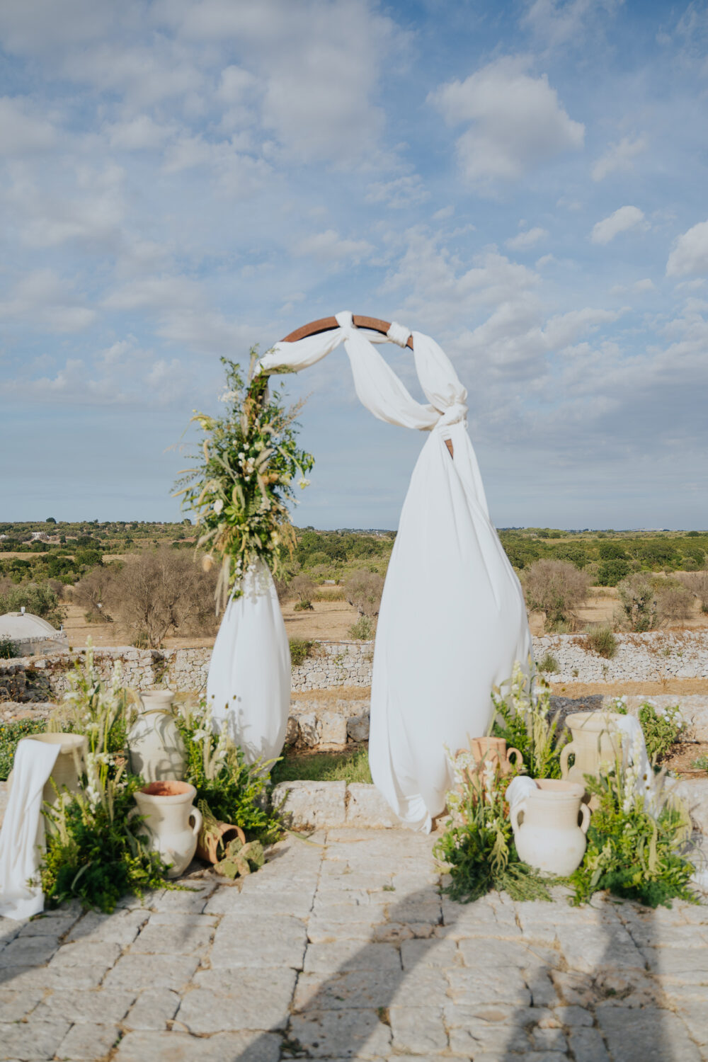 Masseria San Paolo Grande Wedding: Yasemin & Omer's Ostuni Celebration 23 Reception setup at Masseria San Paolo Grande ahead of the wedding dinner