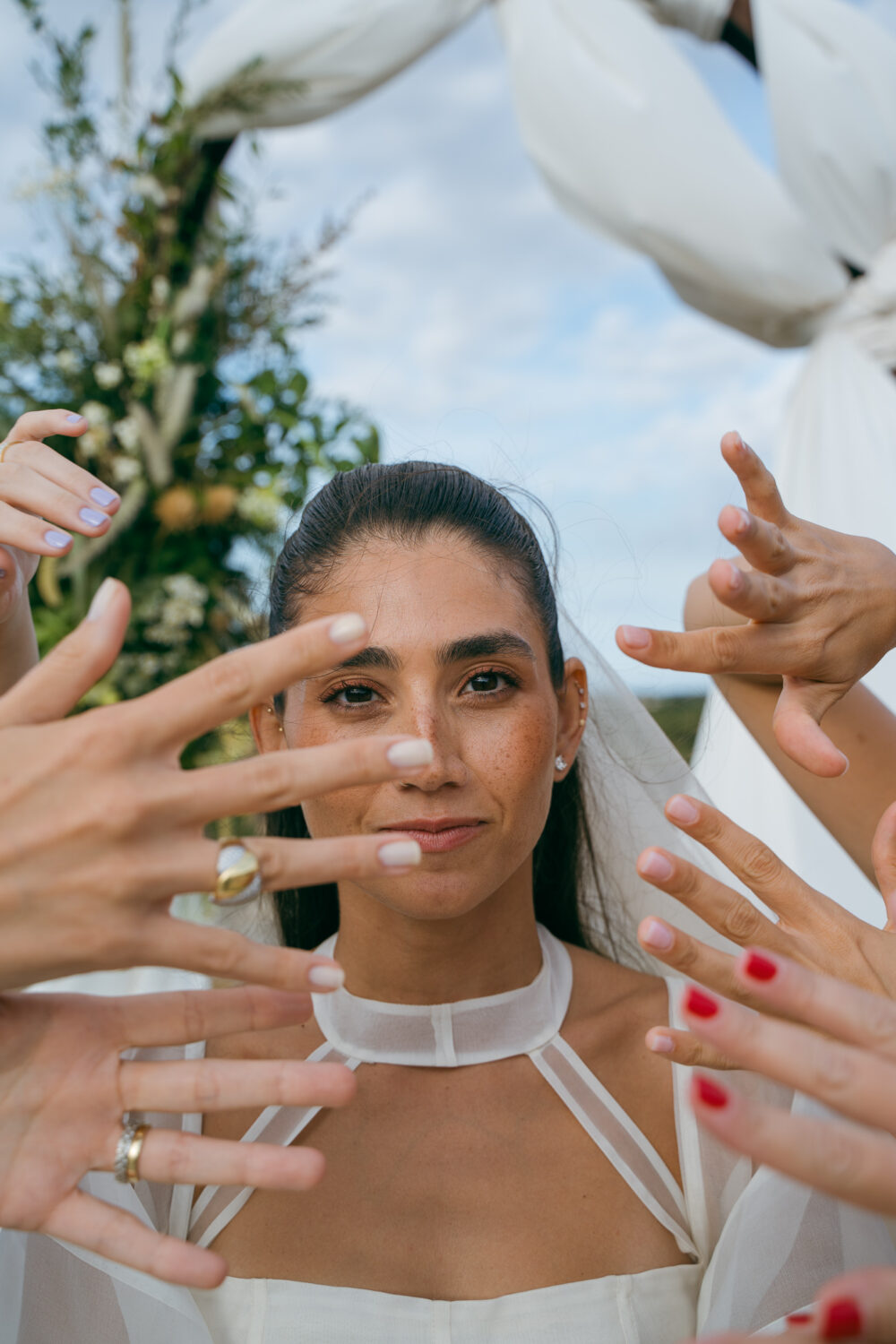 Masseria San Paolo Grande Wedding: Yasemin & Omer's Ostuni Celebration 50 Bride surrounded by her bridesmaids ahead of the ceremony at Masseria San Paolo Grande