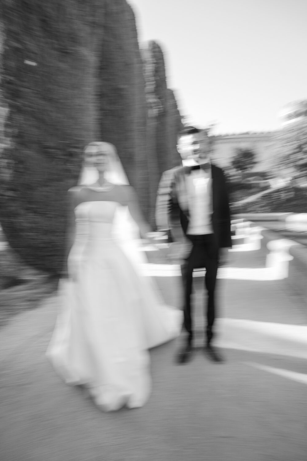 Bride and groom celebrating the horah dance under disco balls at Castell de Sant Marçal