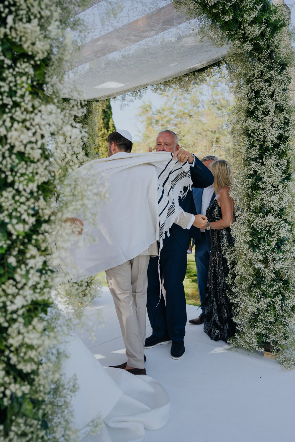Jewish Wedding at Finca Son Mir, Mallorca 20 Couple celebrating with guests during their Mallorca wedding reception