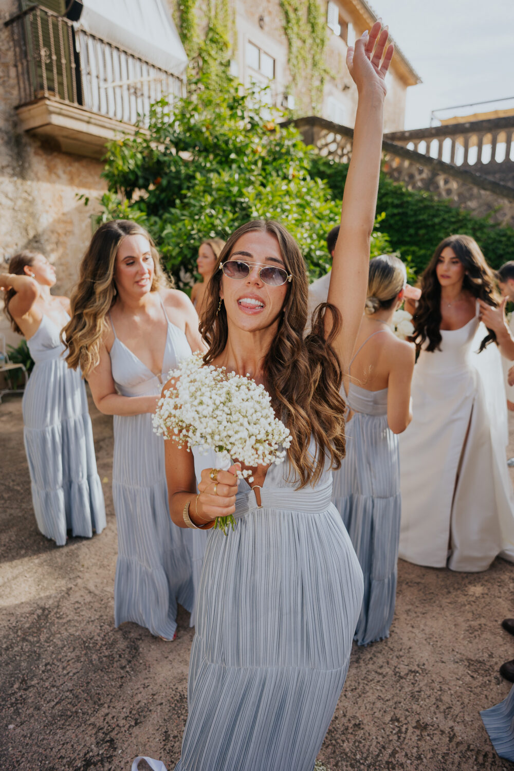 Jewish Wedding at Finca Son Mir, Mallorca 24 Bride and groom walking through the finca gardens after the ceremony